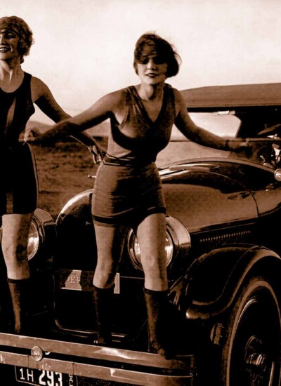 Women on standing on bumper of 1920's era car From Savannah Museum Collection