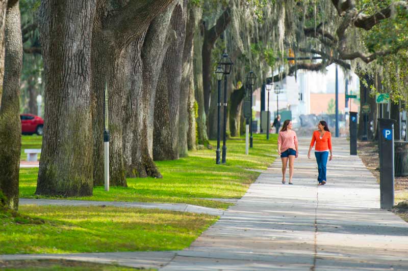 Two women walking around Savannah