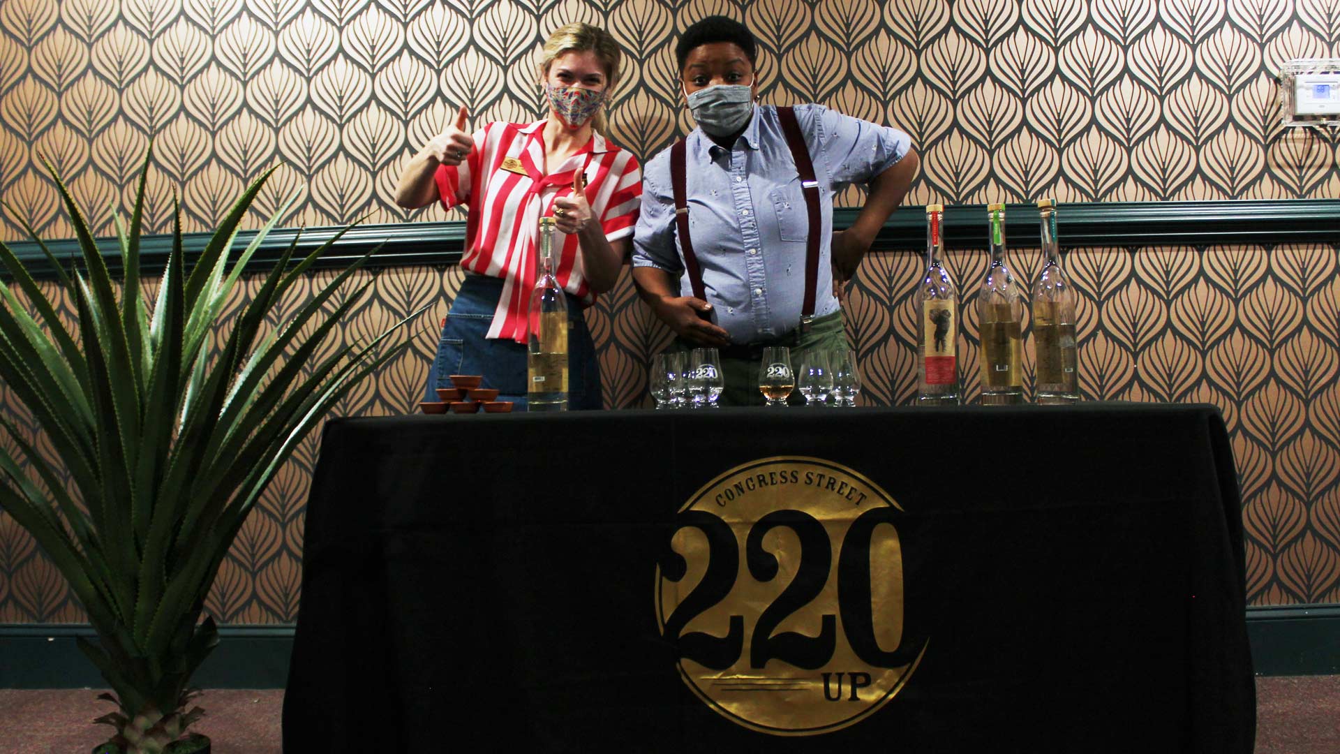 Bartenders serving tequila in Savannah at congress street up