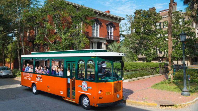 old town trolley infront of the mercer house